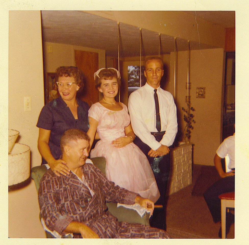 Marvin and Ann Waldrip with family gathered in the living room